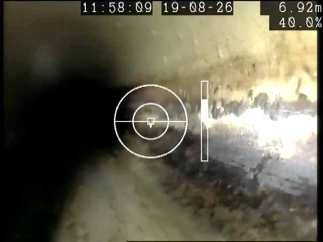 Build-up along the wall of a sewer, recorded at 6.92 metres into an ARPCO inspection run.